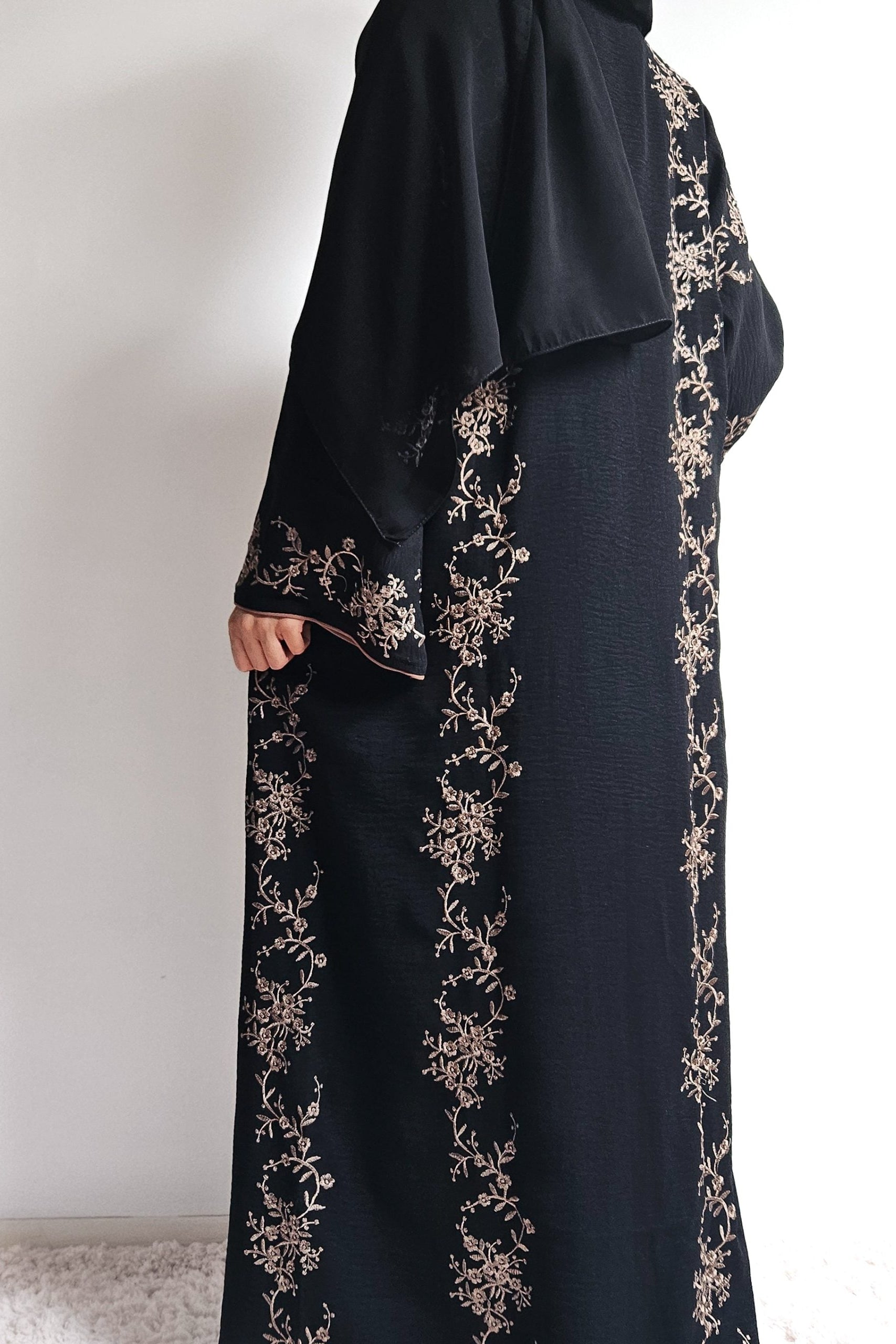 Black abaya with gold threadwork, wear open or closed