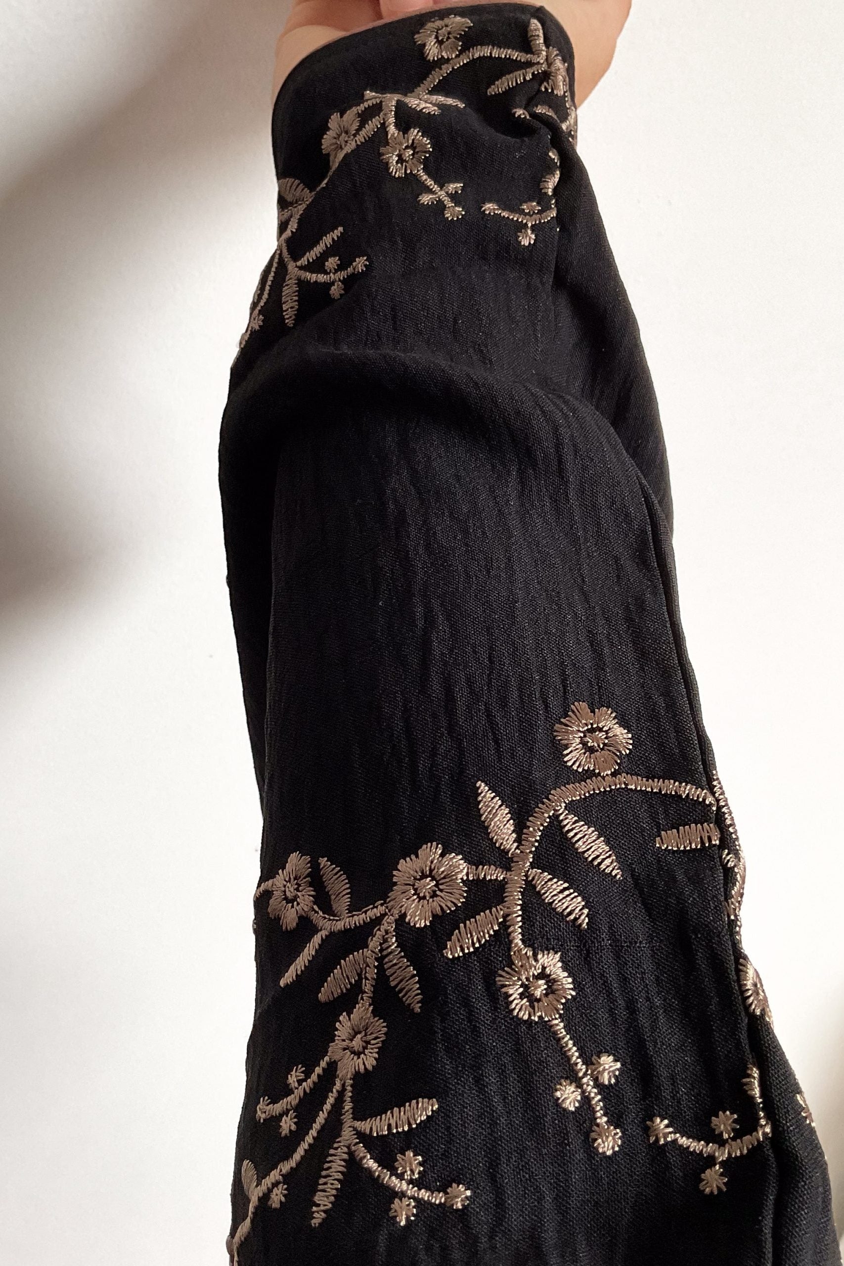Black abaya with gold threadwork, wear open or closed